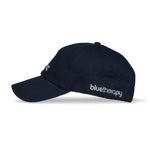 Load image into Gallery viewer, Side view of navy blue dad hat with white embroidered bluetherapy logo on side
